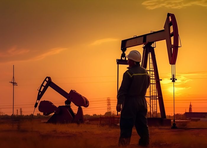 worker-oil-rig-sunset-created-with-generative-ai-technology-min
